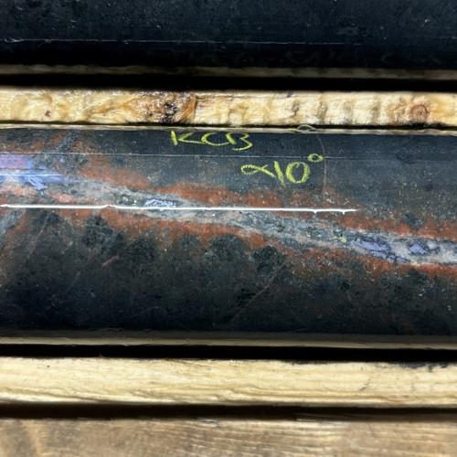 0.09% Cu, 0.01 g/t Au, 0.5 g/t Ag, 0.48% Mo from 219.5m to 220m